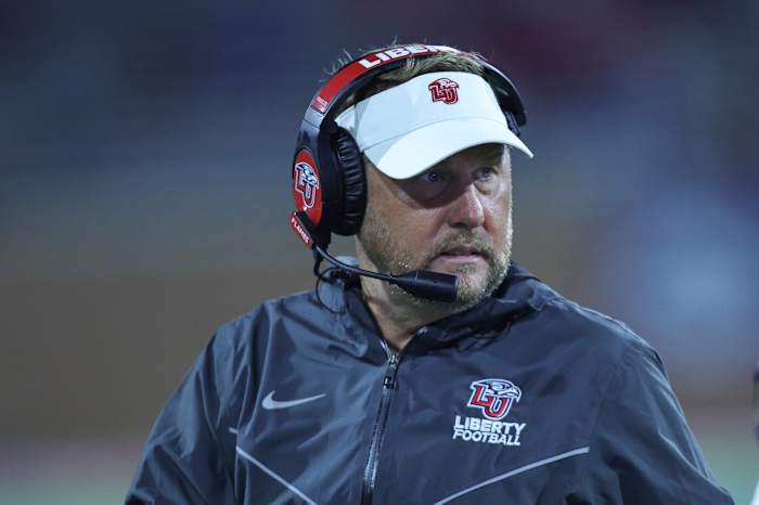Dec 18, 2021; Mobile, Alabama, USA; Liberty Flames head coach Hugh Freeze watches his defense on the field in the first quarter during the 2021 LendingTree Bowl at Hancock Whitney Stadium. Mandatory Credit: Robert McDuffie-USA TODAY Sports
